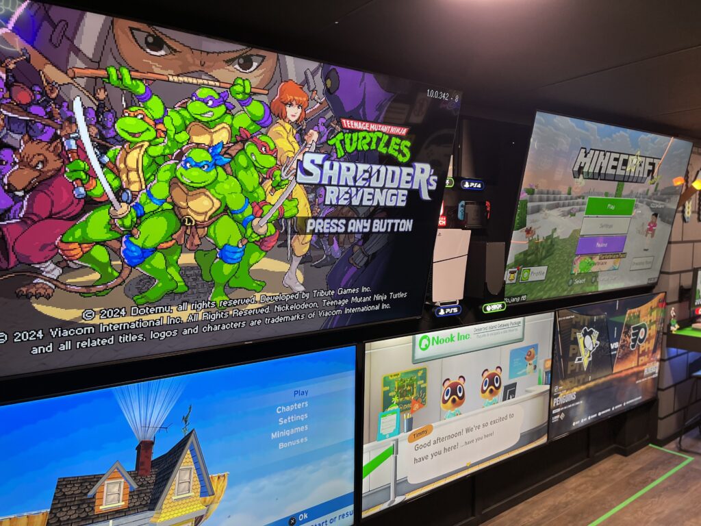 Gallery: (2) 85" 4k ULED TVs and (3) 65" 4k ULED TVs amass this 15-foot video wall connected to (2) PS5s, (1) Xbox Series X, (1) Xbox Series S, and (1) Nintendo Switch 2.
