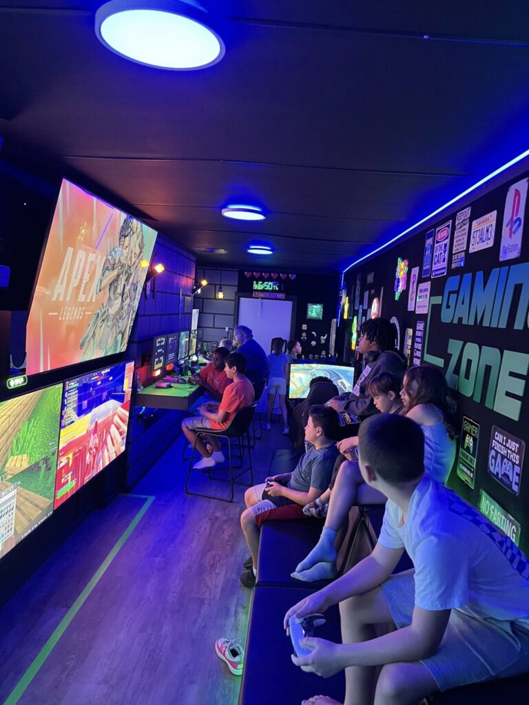 Party Recommendations - Game Truck interior with arcade style lighting