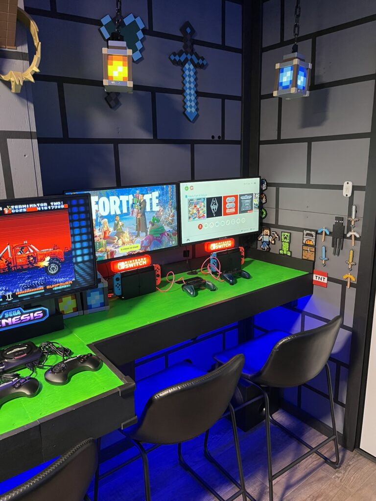 (2) Nintendo Switches connected to (2) 24″ HDTV monitors
